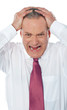 Portrait of businessman expressing frustration
