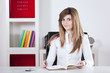 Detalii fotografie Businesswoman writing on the notepad