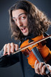 Violin player playing the intstrument Violin player playing the intstrument