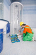 Plumber working in the bathroom Plumber working in the bathroom