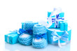 beautiful gifts and baby's bootees isolated on white