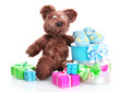 beautiful gifts, baby's bootees and bear toy  isolated on white