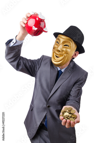 Photo: Man with piggybank on white Man with piggybank on white