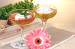 fruit jelly in glasses and fruits on table in cafe fruit jelly in glasses and fruits on table in cafe
