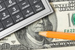 Calculator, money and pencil Calculator, money and pencil