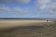 playing on north sea sands, netherlands