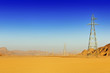 Photo en ligne au meilleur prix Row of high voltage pylons in the desert of Wadi Rum