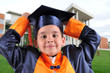 Cute boy in graduation uniform