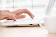 Female hands on laptop