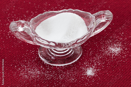 Photo: Cut glass bowl full of table salt Cut glass bowl full of table salt