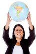 canvas print picture - Woman holding a globe