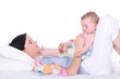 Young mother with adorable baby girl