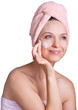 Beautiful woman applying cream