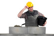 Man building stone wall