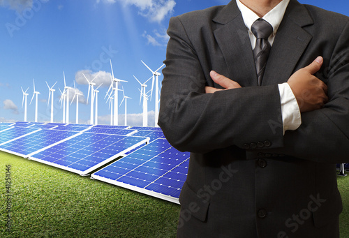 Foto: business man success with energy saving business man success with energy saving