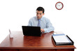 Foto: Businessman iworking at office desk Businessman iworking at office desk