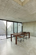 beautiful modern house in cement, interior, wooden dining table