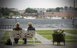 Foto: a couple near sea in Stockholm a couple near sea in Stockholm