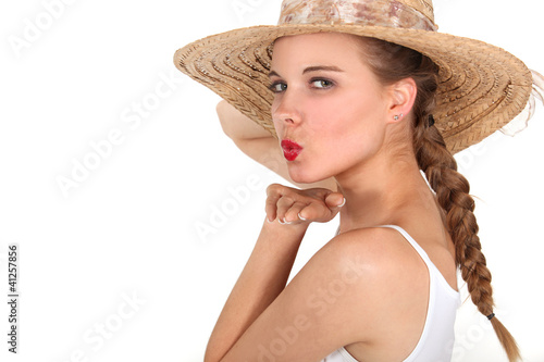 Young woman blowing a kiss