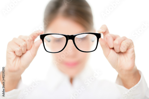 Photo: Glasses - optician showing eyewear Glasses - optician showing eyewear
