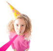 Happy small girl celebrating birhday.