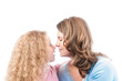 Happy mother and daughter close together.