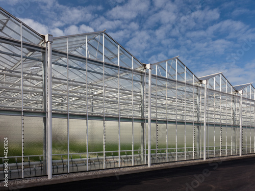 Photo: Sideview of a newly build greenhouse Sideview of a newly build greenhouse