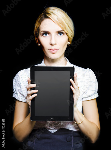 Photo: Business woman holding touchpad tablet Business woman holding touchpad tablet