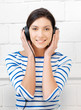 happy teenage girl in big headphones