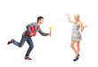 Boyfriend running with flowers and heart shape object towards hi