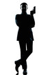 Photo: silhouette man full length secret agent in a james bond posture silhouette man full length secret agent in a james bond posture
