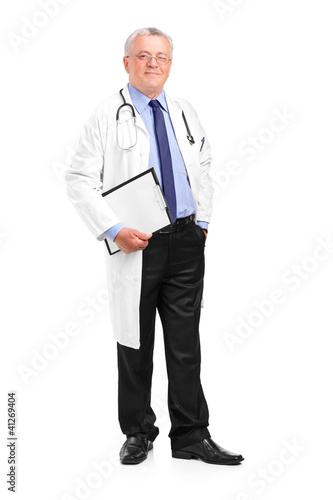 Photo: Full length portrait of a mature healthcare professional posing Full length portrait of a mature healthcare professional posing