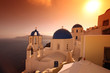 Santorini with famous churches against in Oia village, Greece