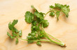 Coriander on chopping board