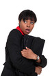 Scared businesswoman clutching folder