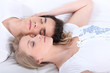 Couple asleep in bed