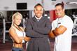 happy group gym manager and trainers