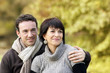Loving couple walking in the woods