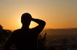 silhouette of man enjoying sunset over freiburg silhouette of man enjoying sunset over freiburg