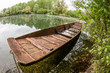 old wooden boat on lake old wooden boat on lake