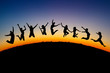 silhouette of teens jumping on hill silhouette of teens jumping on hill