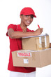 young woman delivering parcels