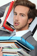 Male office worker under pressure