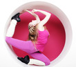 woman posing in pink circle