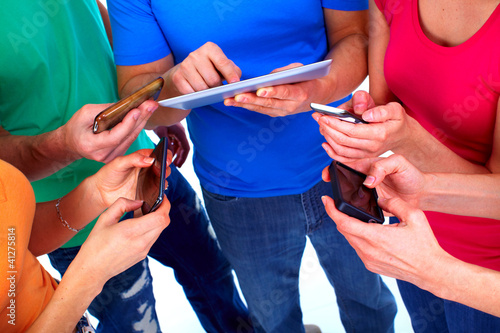 Photo: Human hands with tablet and smartphone. Human hands with tablet and smartphone.