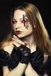 Photo: young woman with creative face-art young woman with creative face-art