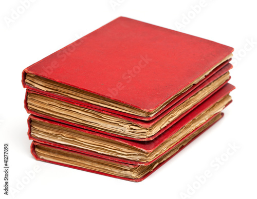Photo: stack of old books with red covers stack of old books with red covers