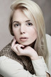 Portrait of beautiful woman isolated on beige