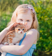 smile girl with cat outdoor