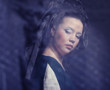 Photo: woman with long hair in historical medieval green dress woman with long hair in historical medieval green dress